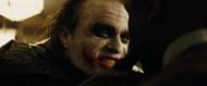 This line, delivered with the Joker's signature creepy laugh, is a testament to his insanity and unpredictability (Image via Warner Bros)